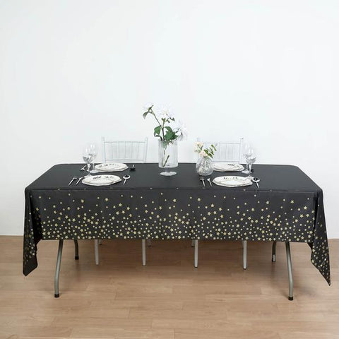 54x108 in Rectangular Disposable Plastic Tablecloth with Star Sprinkled Design
