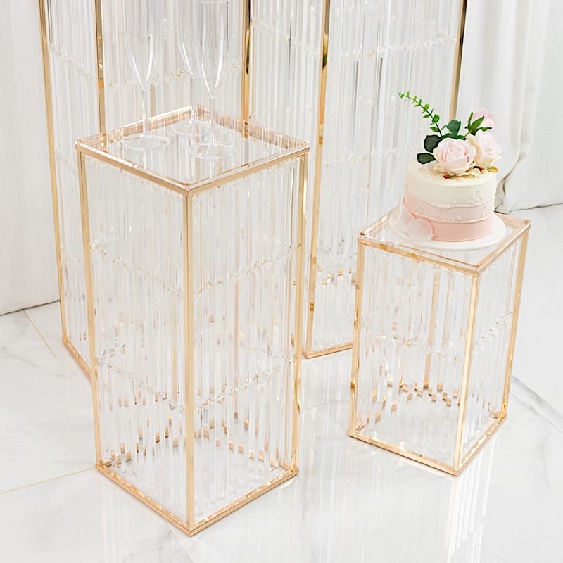 4 Gold Rectangular Metal Pedestal Stands with Acrylic Top and Crystal Pendant Strip Chains