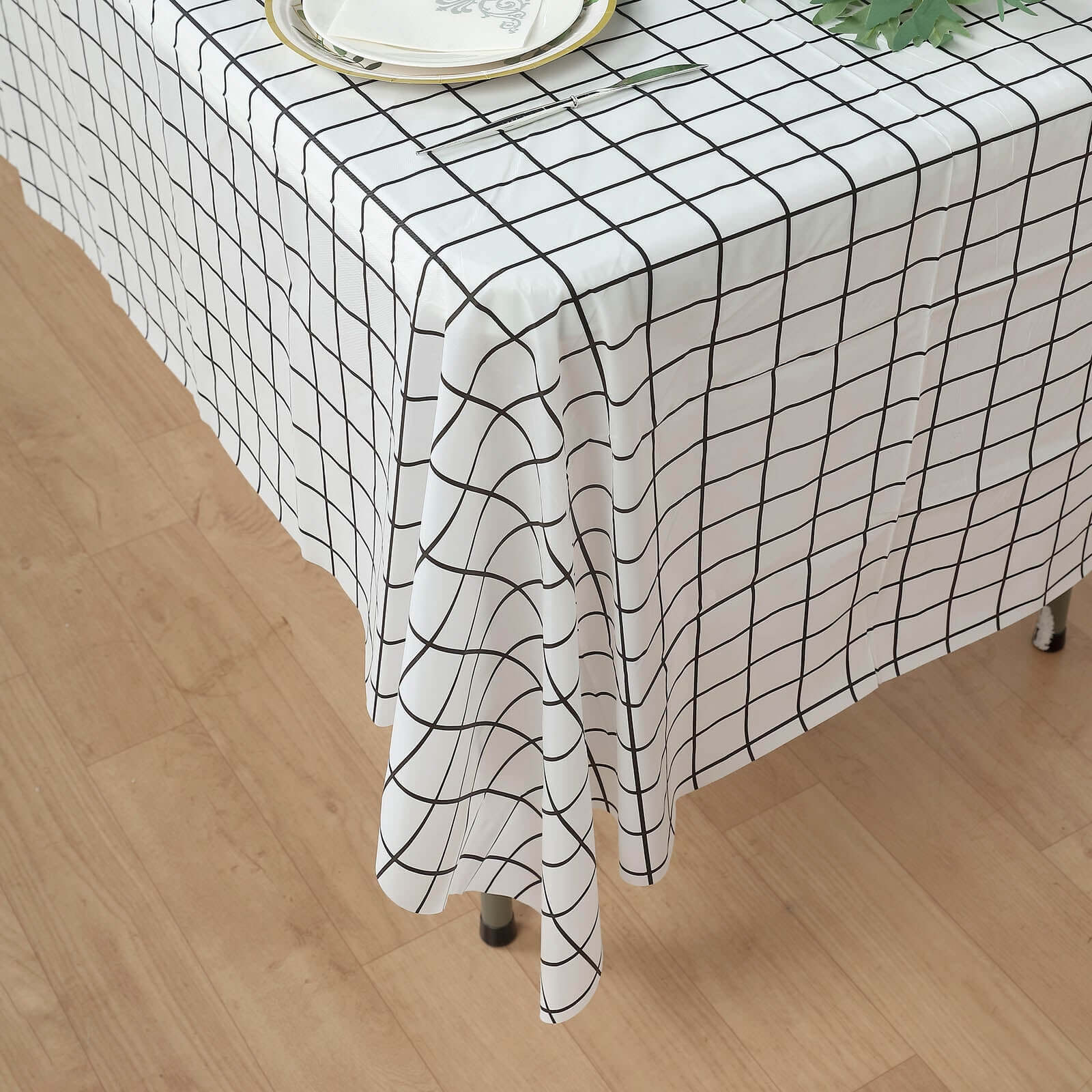 5 Black and White 54x108 in Rectangular Grid Plastic Table Covers