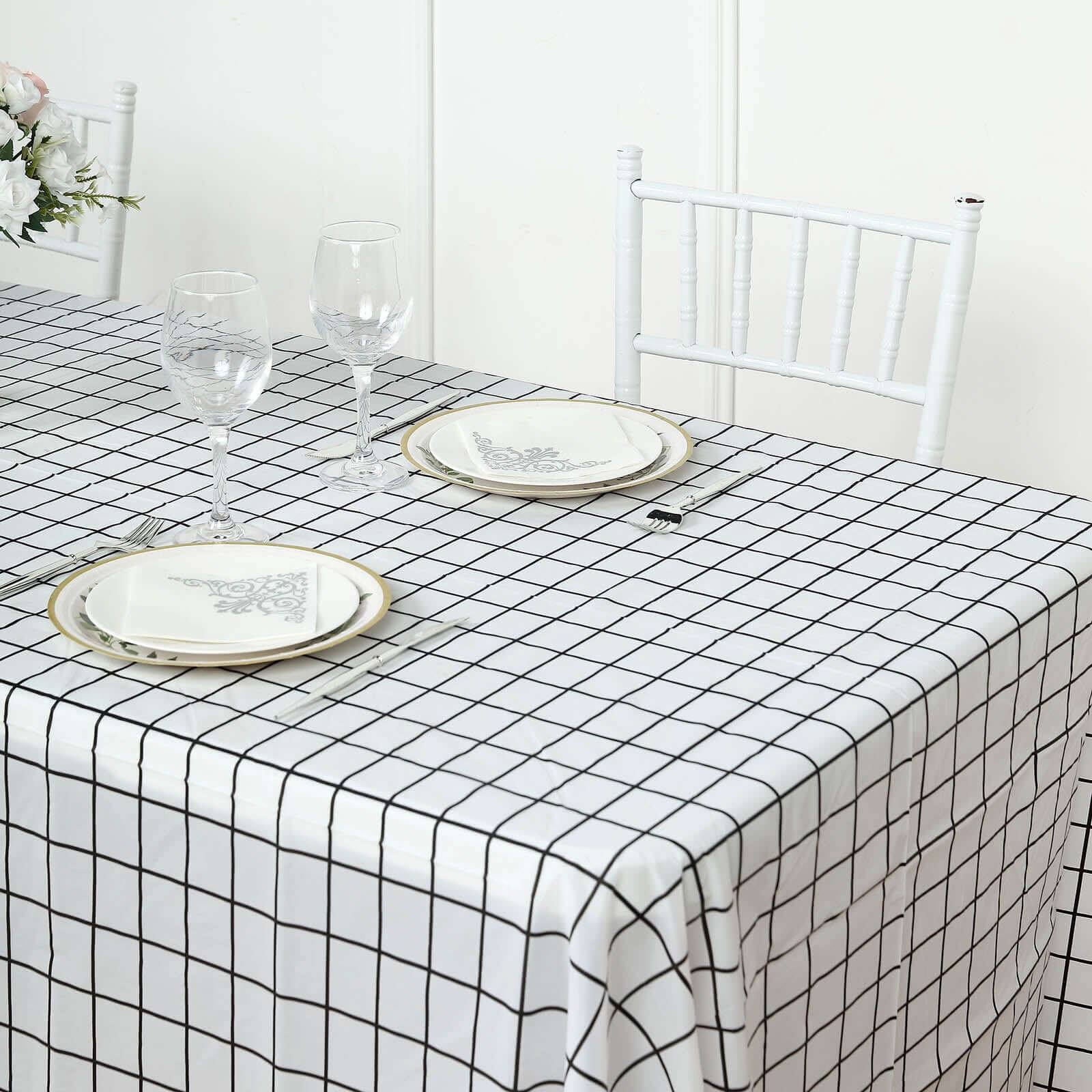 5 Black and White 54x108 in Rectangular Grid Plastic Table Covers