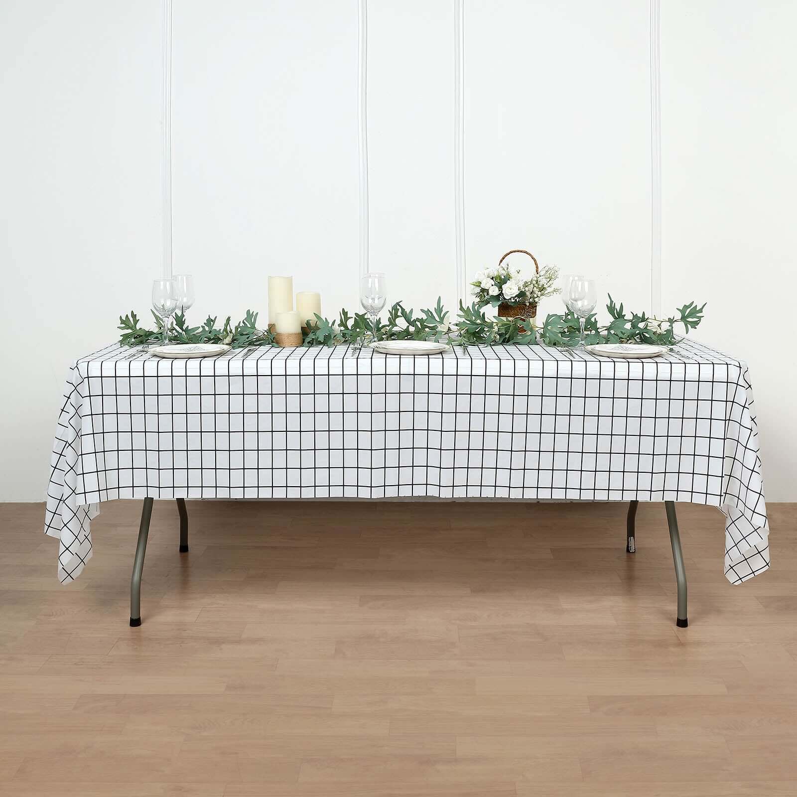 5 Black and White 54x108 in Rectangular Grid Plastic Table Covers