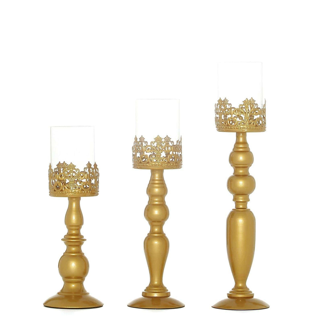 https://balsacircle.com/cdn/shop/products/balsa-circle-candle-holders-3-gold-12-14-17-in-tall-metal-with-lacy-trim-glass-candle-holders-centerpieces-chdlr-cand-028-set-gold-11906110226480_1024x1024.jpg?v=1628600290