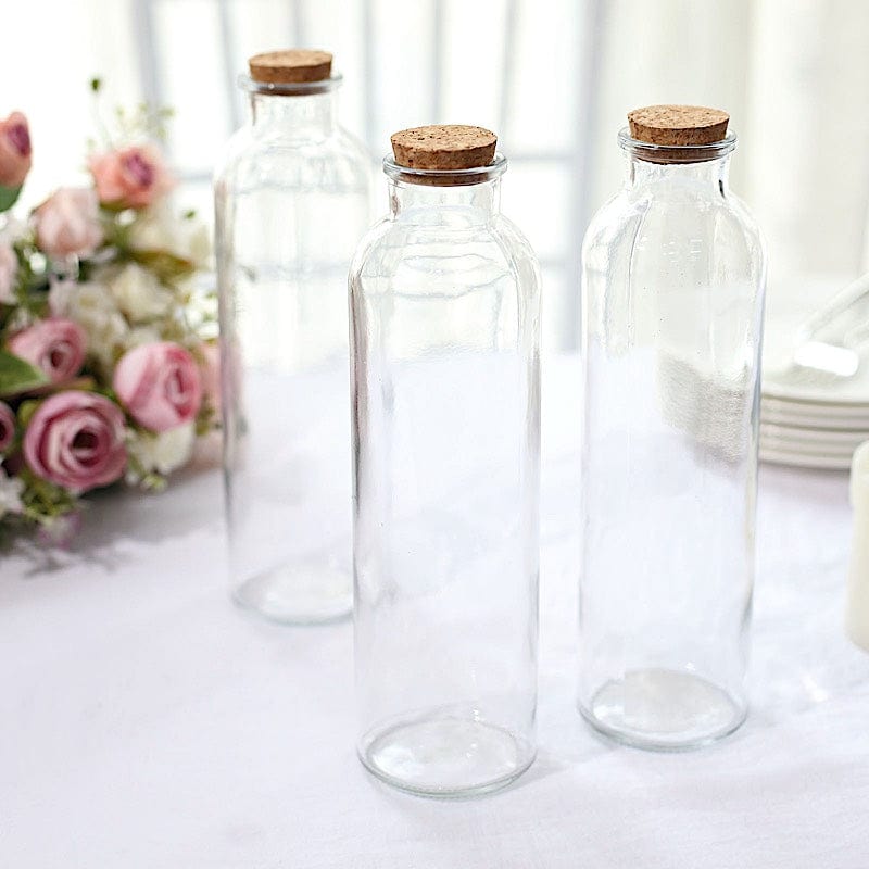 https://balsacircle.com/cdn/shop/products/balsa-circle-favor-holders-12-clear-16-oz-round-storage-jars-refillable-glass-bottles-with-cork-stopper-glas-jar20-16-clr-31289250676784_800x800.jpg?v=1676366521