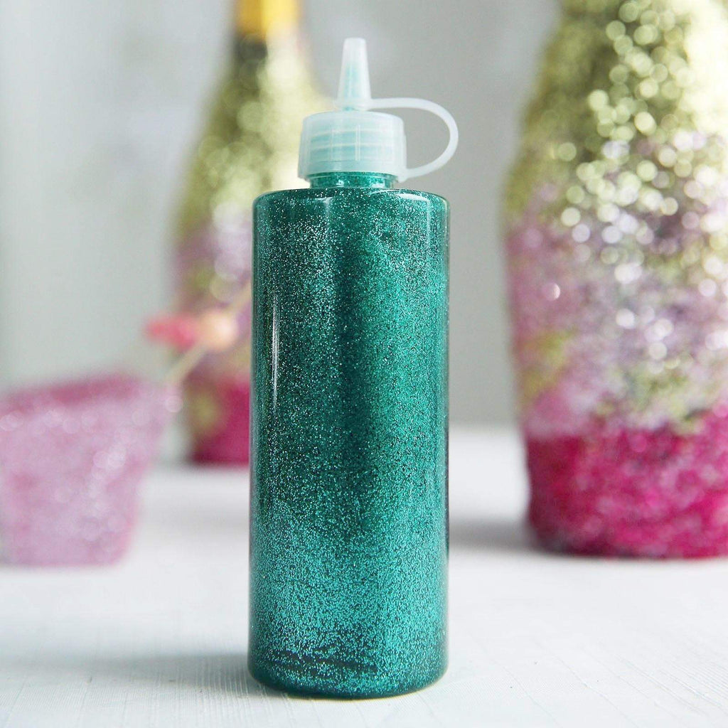 Water bottle shakers, filled with ribbon, glitter, feathers, garland, yarn,  buttons, jingle bells, etc…