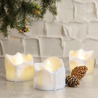 12 White 1.5 in Battery Operated LED Tealight Candles with Dripping Wax Design
