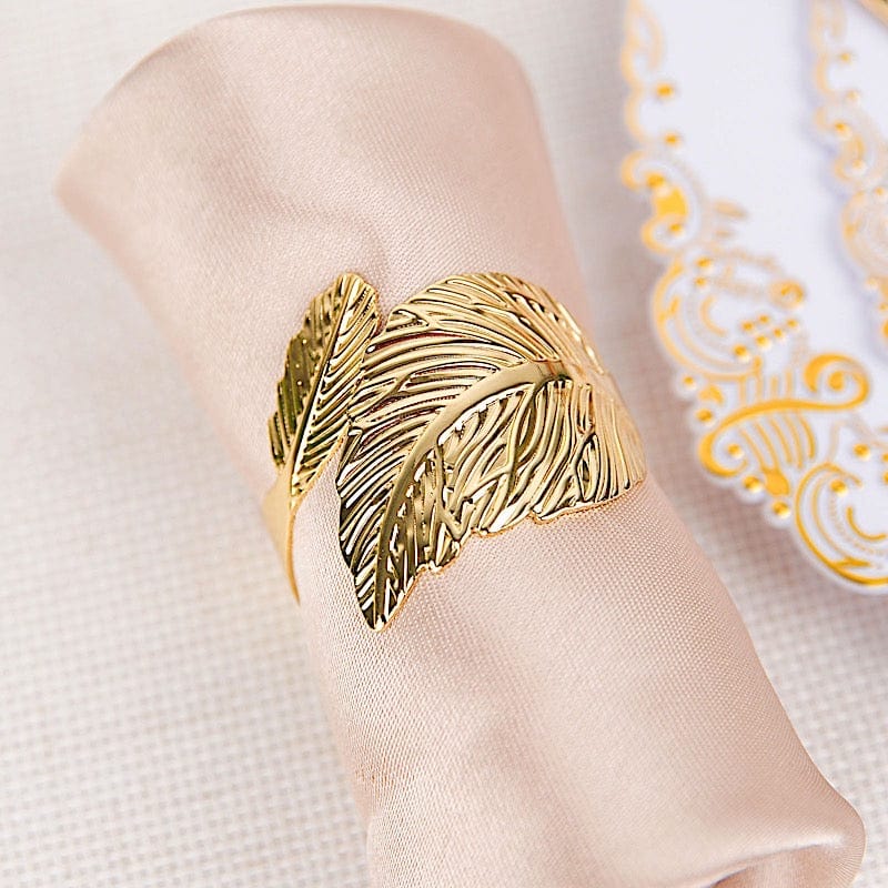 4 Metallic Gold Napkin Rings with Ornate Leaf Design
