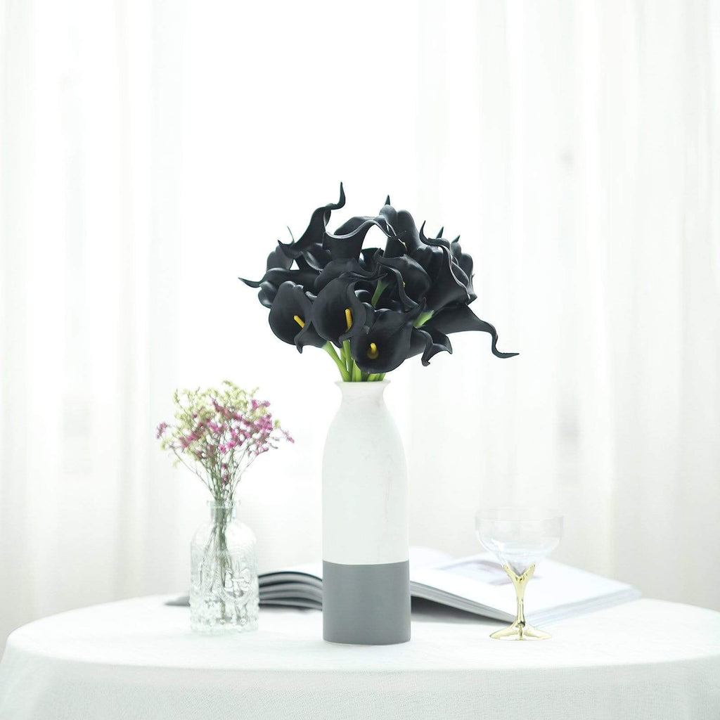 Black and white table decor. Simple, eye catching placecards. Center piece  made with black twigs, calla lilies…